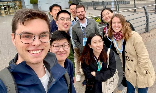 A group of people smiling