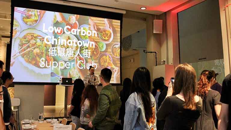 MCFP students dining with low-carbon Asian dishes at Manchester Museum