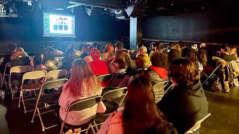 MCFP students enjoying a movie and pizza night at Students’ Union
