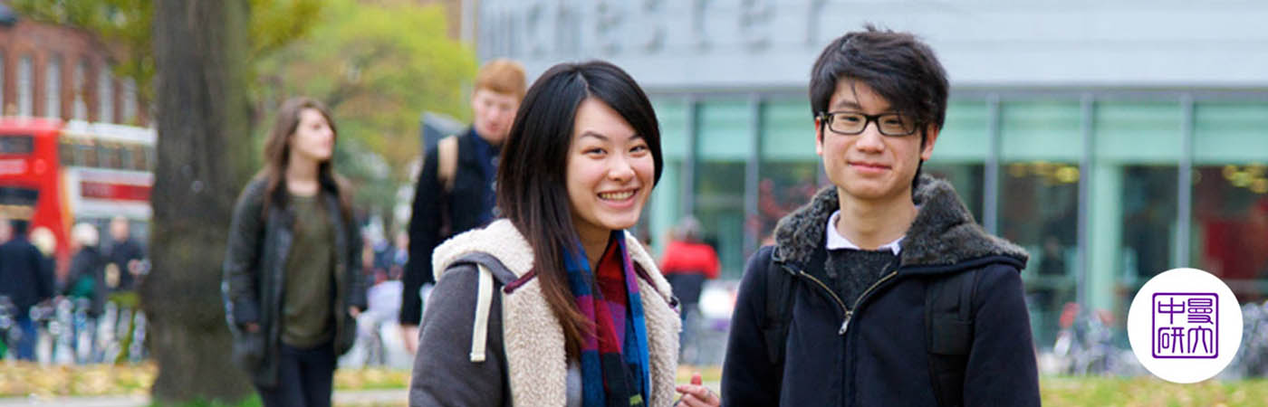 Two Chinese students smiling on campus